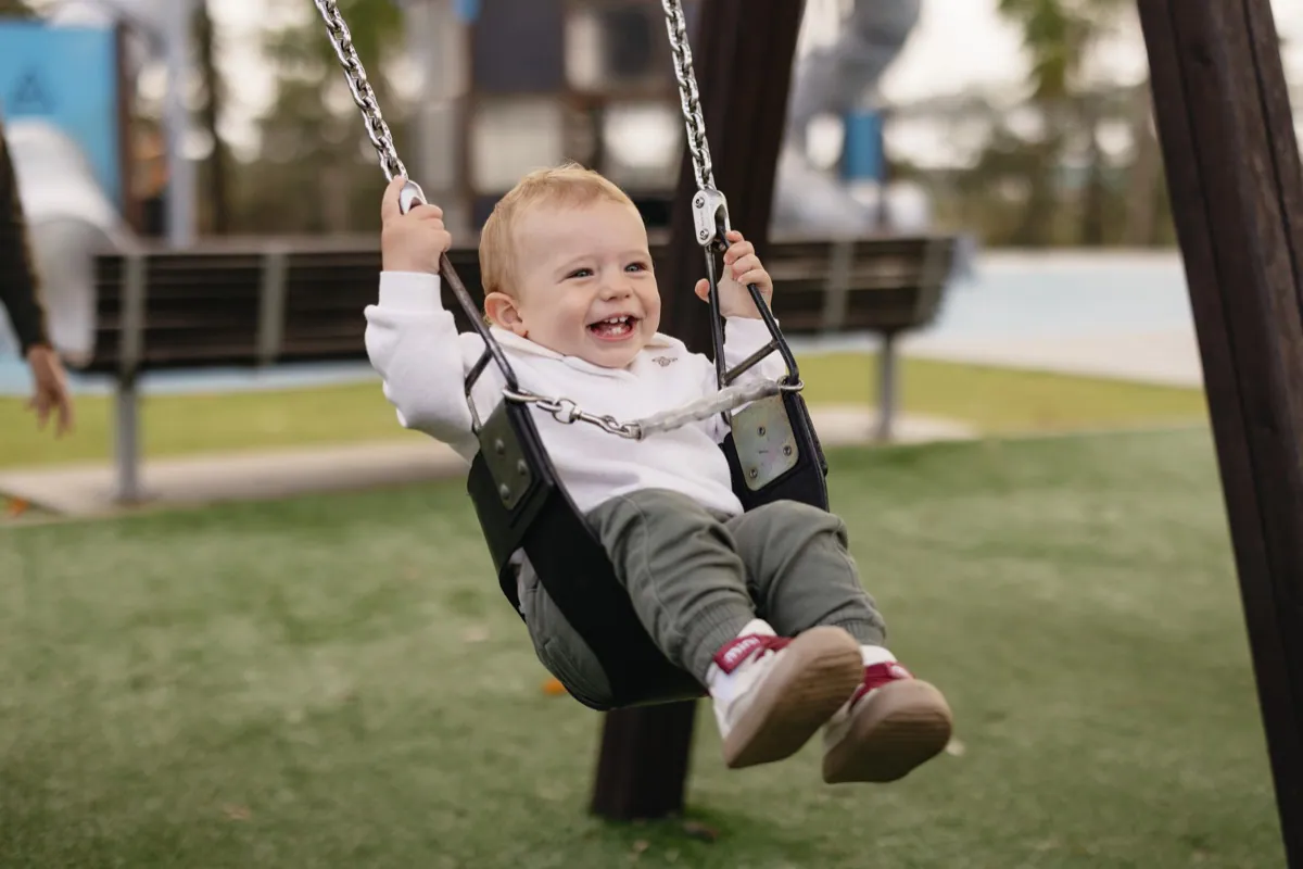 Child enjoying a Huntlee playground