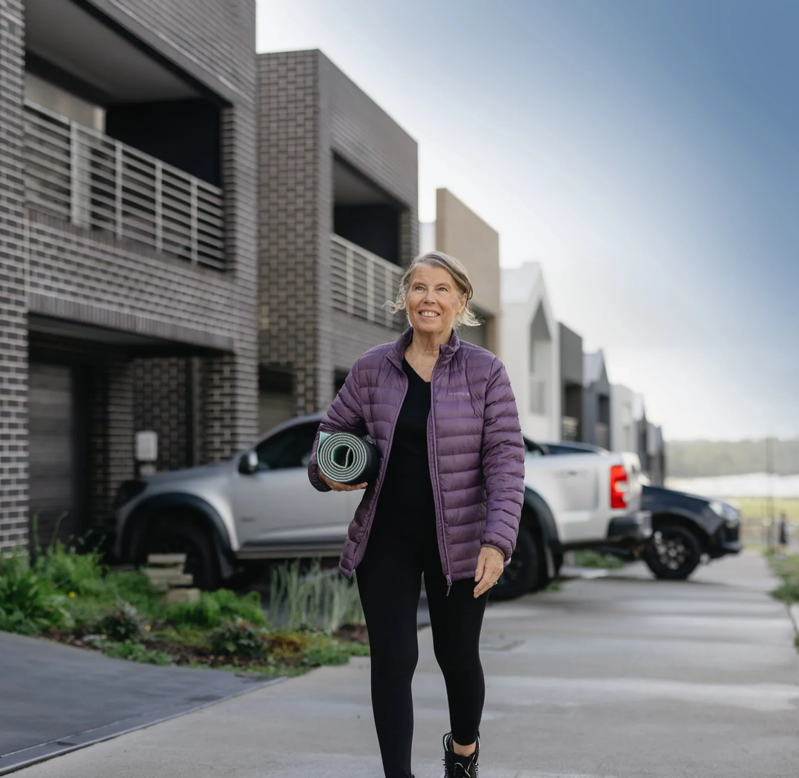 Resident walking through the Urban Series neighbourhood