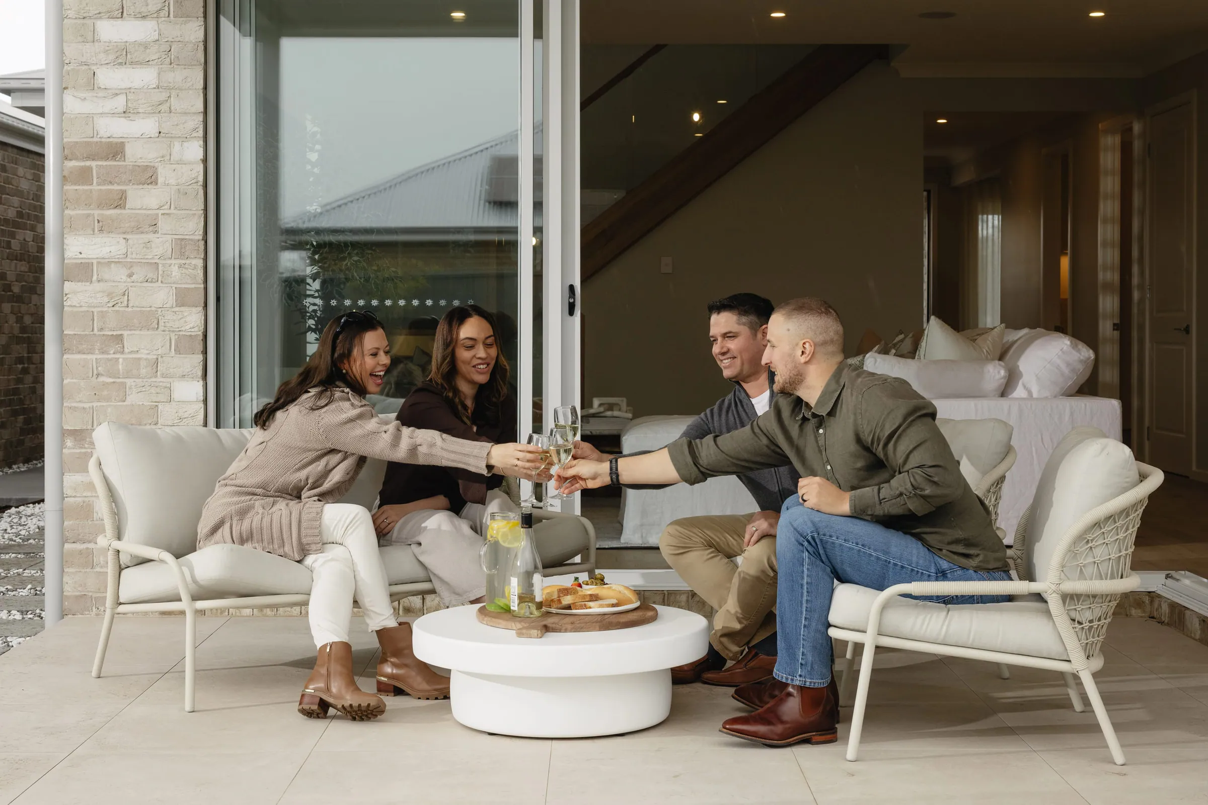 Friends relaxing together at an Urban Series home